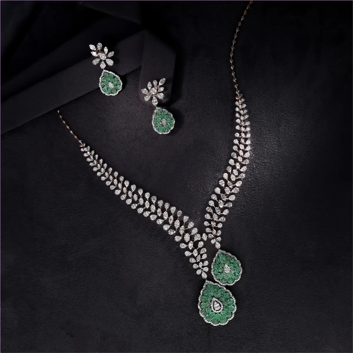 Emerald and diamond necklace and earring set