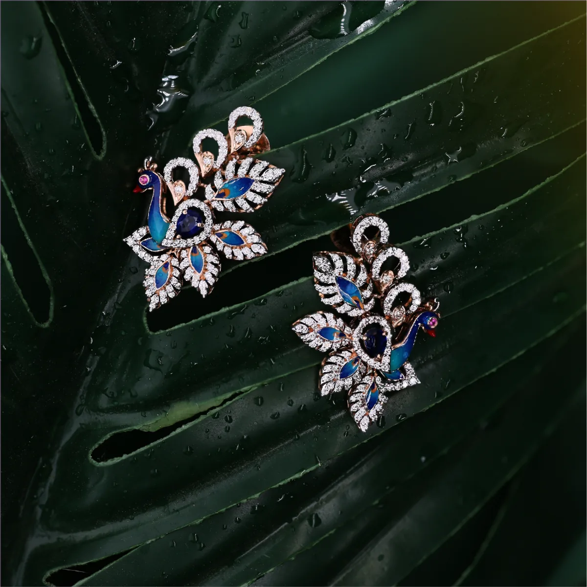Peacock-design blue stone earrings